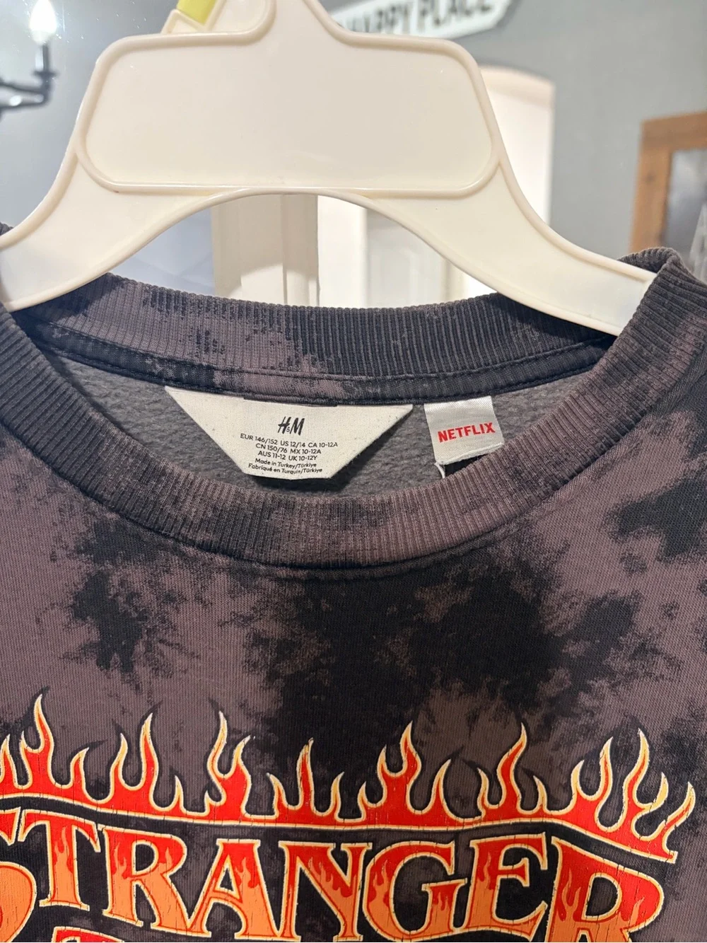 H&M Black Tie-Dye Stranger Things Sweatshirt with Orange Logo